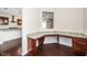 Office nook with granite countertop desk, wood cabinets and drawers, located off of kitchen at 518 Parlier Dr # 82, Apex, NC 27523