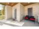 Covered porch with brick, seating, and outdoor access at 518 Parlier Dr # 82, Apex, NC 27523