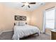 This cozy bedroom features carpet, a ceiling fan, and neutral walls at 52 Reserve Dr, Fuquay Varina, NC 27526
