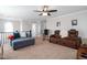 This second floor living room includes a sofa and oversized chair at 52 Reserve Dr, Fuquay Varina, NC 27526
