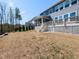 Expansive backyard featuring a well-maintained lawn and scenic views of the surrounding landscape at 521 Ivy Arbor Way, Holly Springs, NC 27540