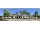 Elegant community clubhouse with manicured landscaping, offering a welcoming and luxurious experience for residents at 521 Ivy Arbor Way, Holly Springs, NC 27540