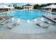 Inviting community pool with water features and lounge seating, offering a resort-style experience for residents at 521 Ivy Arbor Way, Holly Springs, NC 27540