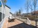 Spacious deck with dining table and chairs, perfect for outdoor entertaining and gatherings at 521 Ivy Arbor Way, Holly Springs, NC 27540
