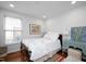 Well-appointed bedroom with hardwood floors and stylish furnishings at 528 Moseley Ln, Raleigh, NC 27601