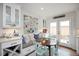 Cozy breakfast nook features built-in bench seating and natural light, steps from the kitchen at 528 Moseley Ln, Raleigh, NC 27601