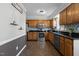 Functional kitchen featuring stainless steel appliances, ample cabinetry, and granite countertops at 5313 Wenesly Ct, Raleigh, NC 27616