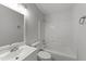 Bathroom with a shower-tub combo and neutral colored walls at 5408 Rivercrest Dr, Youngsville, NC 27596