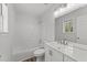 Bathroom featuring a shower-tub combo and single sink vanity at 5408 Rivercrest Dr, Youngsville, NC 27596
