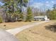 Home with large front yard and long driveway at 5408 Rivercrest Dr, Youngsville, NC 27596