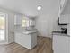 Efficient kitchen with island, granite countertops, and new appliances, perfect for cooking and entertaining at 5408 Rivercrest Dr, Youngsville, NC 27596