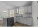 Bright and updated kitchen with granite countertops, stainless steel appliances, and ample cabinet space at 5408 Rivercrest Dr, Youngsville, NC 27596