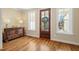 Bright entryway with hardwood floors, natural light, and a decorative table at 56 Mist Wood Ct, Pittsboro, NC 27312