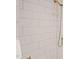 Shower stall featuring a handheld sprayer and clean, elegant tilework at 56 Mist Wood Ct, Pittsboro, NC 27312