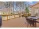 Spacious backyard deck with a dining table and chairs, great for outdoor entertaining and relaxation at 5624 Bennettwood Ct, Raleigh, NC 27612