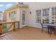 Expansive deck with outdoor dining area and views of the home's exterior and backyard at 5624 Bennettwood Ct, Raleigh, NC 27612