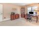 This office has shelving, desk, and a large window for ample natural light at 5624 Bennettwood Ct, Raleigh, NC 27612