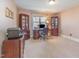 This well-lit office has shelving, desk, and a large window for ample natural light at 5624 Bennettwood Ct, Raleigh, NC 27612