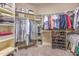 Spacious walk-in closet with custom shelving and organization systems at 5624 Bennettwood Ct, Raleigh, NC 27612