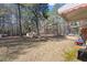 This property boasts a spacious backyard, complete with a picnic table for outdoor gatherings at 5630 Jones Sausage Rd, Garner, NC 27529