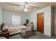 Bedroom with chair, wooden furniture and carpet at 5630 Jones Sausage Rd, Garner, NC 27529