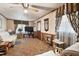 Cozy living room features carpet, a sofa, and a television at 5630 Jones Sausage Rd, Garner, NC 27529