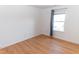 Inviting bedroom with wood floors and a window offering natural light, ready for your personal touch at 603 Mountain Pine Dr, Cary, NC 27519