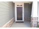 Covered porch with gray front door at 603 Mountain Pine Dr, Cary, NC 27519