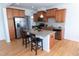 Kitchen with stainless steel appliances, granite countertops, and breakfast bar at 603 Mountain Pine Dr, Cary, NC 27519