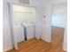 Laundry room with washer and dryer in closet, and wire shelving at 603 Mountain Pine Dr, Cary, NC 27519