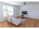 Bright living room with plush sofa and large window at 603 Mountain Pine Dr, Cary, NC 27519