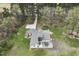 Overhead view of home with outdoor entertaining and patio seating, long driveway at 610 Flemingtown Rd, Henderson, NC 27537