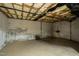 Unfinished basement featuring concrete flooring, and white-painted walls at 610 Flemingtown Rd, Henderson, NC 27537