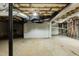 Unfinished basement featuring exposed ceiling beams, ductwork, and concrete flooring at 610 Flemingtown Rd, Henderson, NC 27537