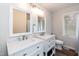 Bright bathroom with double sinks and modern fixtures at 610 Flemingtown Rd, Henderson, NC 27537