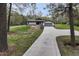 Well manicured lawn and long driveway lead to this lovely modern home at 610 Flemingtown Rd, Henderson, NC 27537