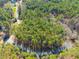 Aerial view of wooded lot located on a quiet street at 63 Pennington Cir, Chapel Hill, NC 27517