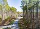 Charming home nestled among mature trees, offering privacy and a serene setting at 63 Pennington Cir, Chapel Hill, NC 27517