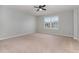 Inviting bedroom boasts natural light from a window and a ceiling fan at 709 Conifer Ct, Creedmoor, NC 27522