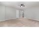 Spacious bedroom featuring neutral carpet and a ceiling fan at 709 Conifer Ct, Creedmoor, NC 27522
