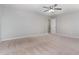 Airy bedroom offers a ceiling fan and an en suite entrance at 709 Conifer Ct, Creedmoor, NC 27522
