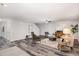 Inviting living room with wood-look flooring, comfortable seating, and stylish decor at 709 Conifer Ct, Creedmoor, NC 27522