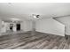 Open floor plan showcasing living area and kitchen space at 709 Conifer Ct, Creedmoor, NC 27522