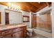Bathroom featuring a vanity, toilet and shower with tile surround at 735 Jordan Hills Loop, Chapel Hill, NC 27517