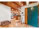 Welcoming foyer showcasing hardwood floors and a glimpse into the modern kitchen at 735 Jordan Hills Loop, Chapel Hill, NC 27517