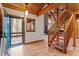 Inviting foyer with a staircase and views of the living room, showcasing the home's open layout at 735 Jordan Hills Loop, Chapel Hill, NC 27517