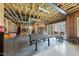 Unfinished basement with ample space for recreation, featuring exposed wood beams and potential living area at 7504 Everton Way, Wake Forest, NC 27587
