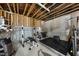 Workout area featuring fitness equipment with a rubber floor and unfinished ceilings and walls at 7504 Everton Way, Wake Forest, NC 27587