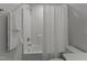 Bright bathroom with white fixtures, a shower-tub combination, and neutral tones at 80 Westbrook Ln, Franklinton, NC 27525