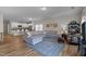 Open-concept layout with living room and kitchen features stylish furnishings and seamless flow, great for entertaining at 80 Westbrook Ln, Franklinton, NC 27525